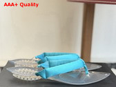 Alaia Invisible Thong Mules in Light Blue Satin Replica