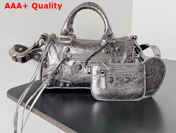 Balenciaga Le Cagole Mini Duffle Bag in Silver Metallized Arena Lambskin Replica