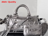 Balenciaga Le Cagole Mini Duffle Bag in Silver Metallized Arena Lambskin Replica