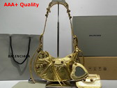 Balenciaga Le Cagole XS Shoulder Bag in Gold Metallized Arena Lambskin Replica