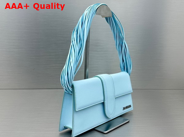 Jacquemus Le Bambino Long Ficiu Strand Strap Flap Bag in Light Blue Smooth Leather Replica