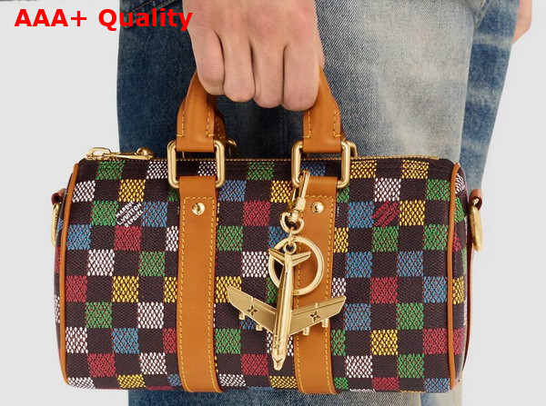 LV Plane Key Holder and Bag Charm in Gold Toned Metal M02542 Replica