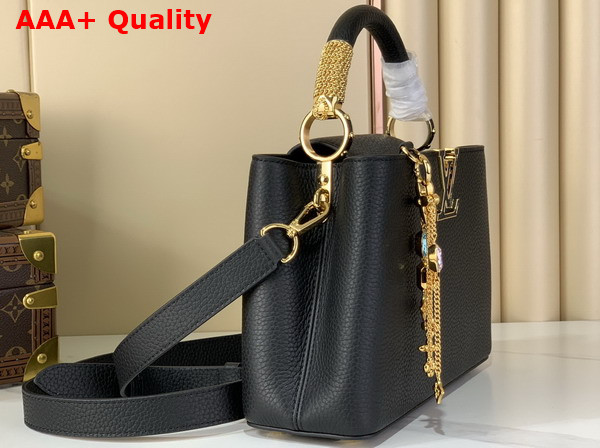 Louis Vuitton Capucines BB Handbag in Black Taurillon Leather Embellished with Tonal LV Initials and a Decorative Stone Embellished Charm Replica