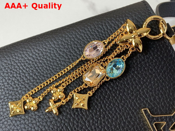 Louis Vuitton Capucines BB Handbag in Black Taurillon Leather Embellished with Tonal LV Initials and a Decorative Stone Embellished Charm Replica