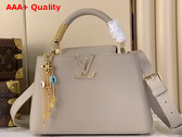 Louis Vuitton Capucines BB Handbag in Galet Gray Taurillon Leather Embellished with Tonal LV Initials and a Decorative Stone Embellished Charm Replica
