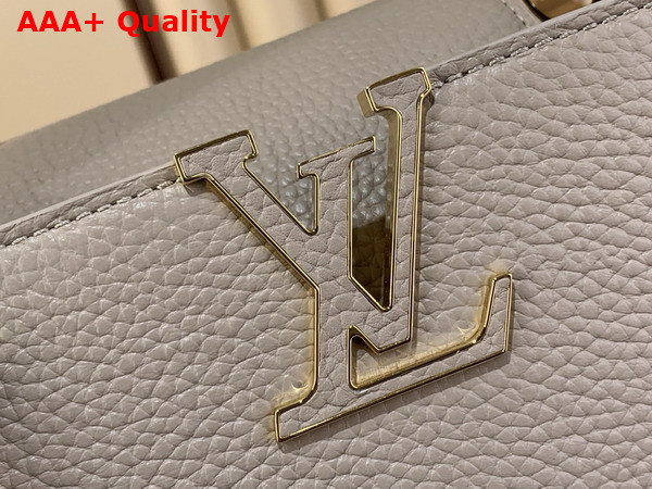 Louis Vuitton Capucines BB Handbag in Galet Gray Taurillon Leather Embellished with Tonal LV Initials and a Decorative Stone Embellished Charm Replica