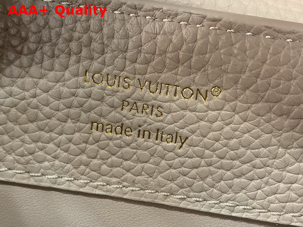 Louis Vuitton Capucines BB Handbag in Galet Gray Taurillon Leather Embellished with Tonal LV Initials and a Decorative Stone Embellished Charm Replica