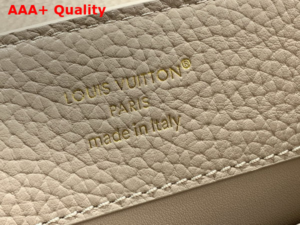 Louis Vuitton Capucines BB Handbag in Galet Gray Taurillon Leather with Gold Toned Charm Detail Replica