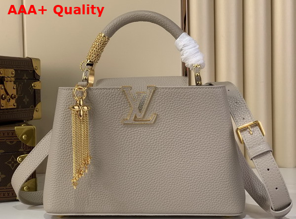 Louis Vuitton Capucines BB Handbag in Galet Gray Taurillon Leather with Gold Toned Charm Detail Replica