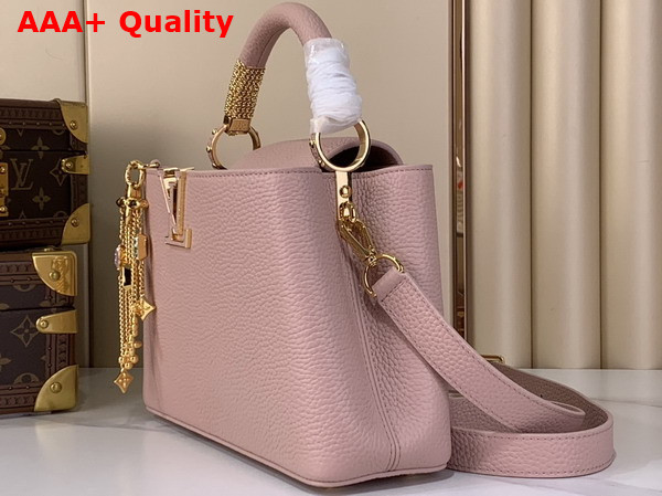 Louis Vuitton Capucines BB Handbag in Jasmine Pink Taurillon Leather Embellished with Tonal LV Initials and a Decorative Stone Embellished Charm Replica