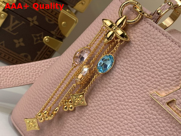 Louis Vuitton Capucines BB Handbag in Jasmine Pink Taurillon Leather Embellished with Tonal LV Initials and a Decorative Stone Embellished Charm Replica