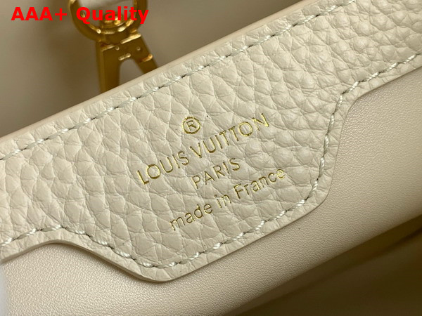 Louis Vuitton Capucines BB Handbag in Snow White Taurillon Leather with Golden Monogram Blossom in Metal Replica