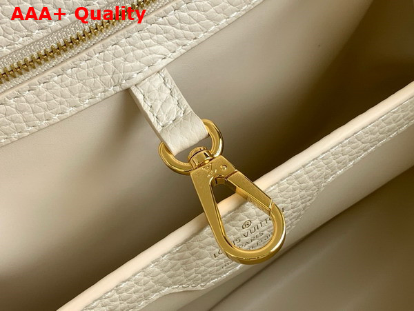 Louis Vuitton Capucines BB Handbag in Snow White Taurillon Leather with Golden Monogram Blossom in Metal Replica