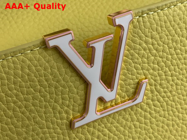 Louis Vuitton Capucines BB Handbag in Sun Beam Yellow Taurillon Leather Features a Joyfully Arty Enameled Chain Replica