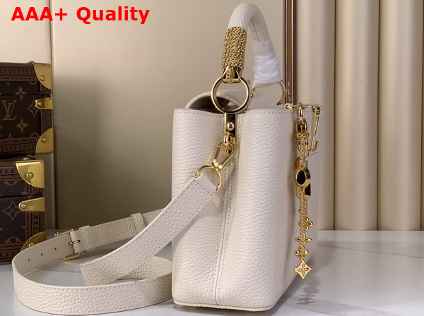 Louis Vuitton Capucines BB Handbag in Vanilla Taurillon Leather Embellished with Tonal LV Initials and a Decorative Stone Embellished Charm Replica