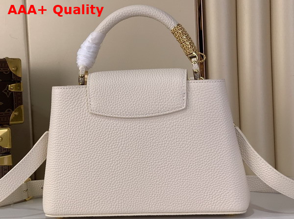 Louis Vuitton Capucines BB Handbag in Vanilla Taurillon Leather Embellished with Tonal LV Initials and a Decorative Stone Embellished Charm Replica