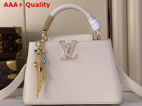 Louis Vuitton Capucines BB Handbag in Vanilla Taurillon Leather Embellished with Tonal LV Initials and a Decorative Stone Embellished Charm Replica