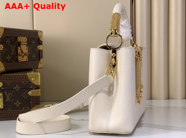 Louis Vuitton Capucines BB Handbag in Vanilla Taurillon Leather with Gold Toned Charm Detail Replica