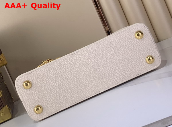 Louis Vuitton Capucines BB Handbag in Vanilla Taurillon Leather with Gold Toned Charm Detail Replica