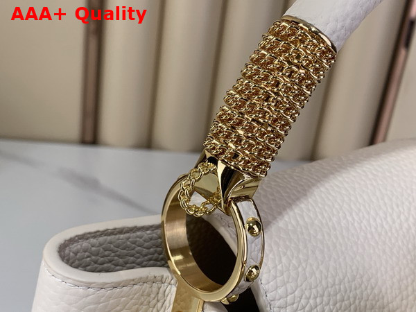 Louis Vuitton Capucines BB Handbag in Vanilla Taurillon Leather with Gold Toned Charm Detail Replica
