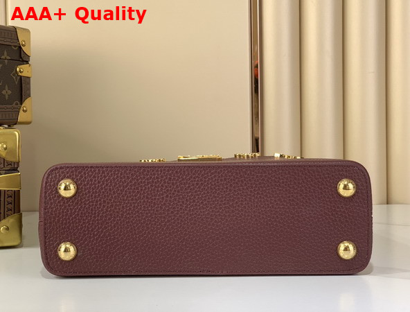 Louis Vuitton Capucines BB in Bordeaux Taurillon Leather Elevated with a Crown of Mother of Pearl Effect Monogram Flowers Replica