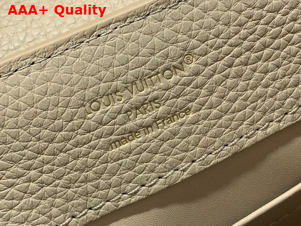 Louis Vuitton Capucines BB in Galet Grey Taurillon Leather with Hand Braided Chain Replica