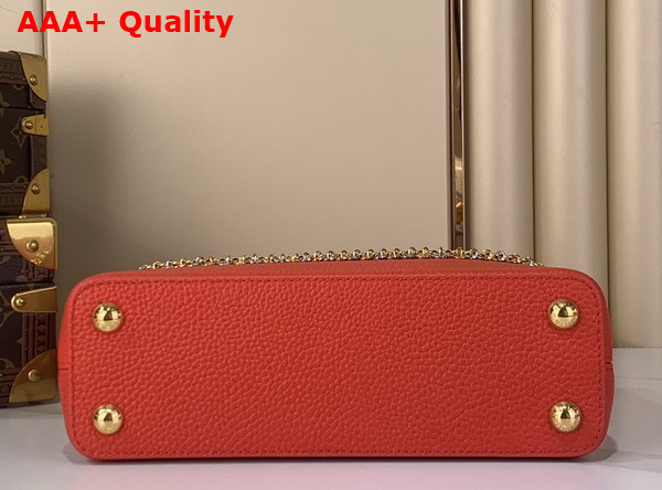 Louis Vuitton Capucines BB in Sari Red Taurillon Leather Adorned with a Charm Embellished Chain Replica