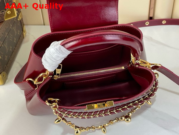 Louis Vuitton Capucines East West BB Grenat Red Cowhide Leather Elevated with Gold Toned LV Initials Replica