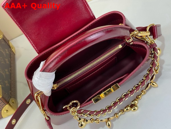 Louis Vuitton Capucines East West BB Grenat Red Cowhide Leather Elevated with Gold Toned LV Initials Replica