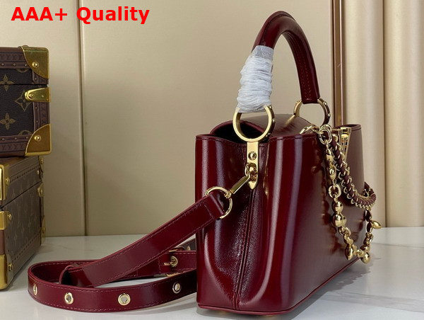 Louis Vuitton Capucines East West BB Grenat Red Cowhide Leather Elevated with Gold Toned LV Initials Replica