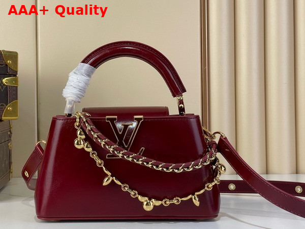 Louis Vuitton Capucines East West Mini Grenat Red Cowhide Leather Elevated with Gold Toned LV Initials M25473 Replica