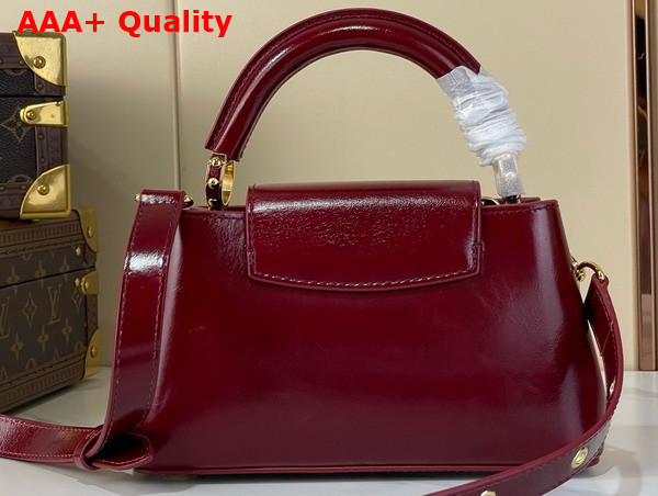 Louis Vuitton Capucines East West Mini Grenat Red Cowhide Leather Elevated with Gold Toned LV Initials M25473 Replica