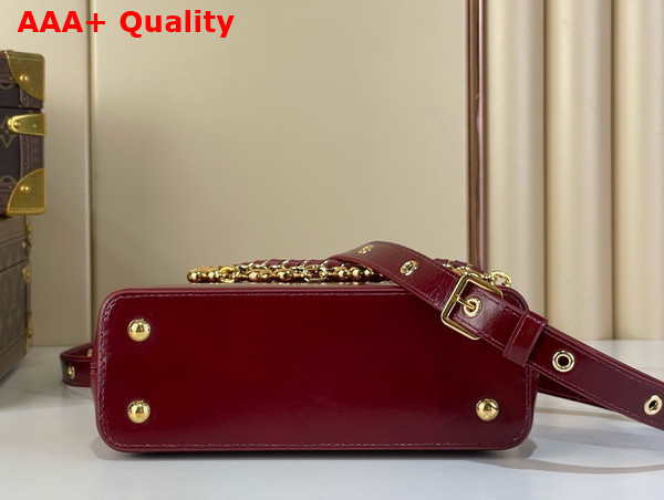 Louis Vuitton Capucines East West Mini Grenat Red Cowhide Leather Elevated with Gold Toned LV Initials M25473 Replica