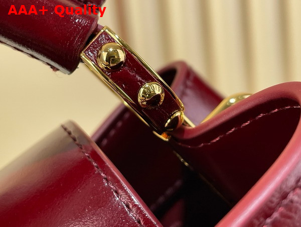 Louis Vuitton Capucines East West Mini Grenat Red Cowhide Leather Elevated with Gold Toned LV Initials M25473 Replica