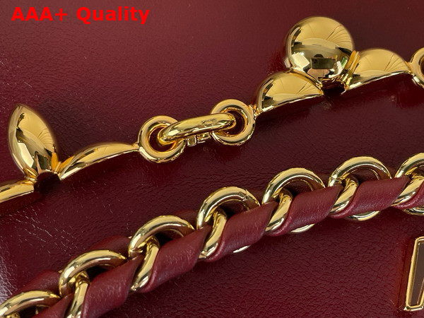 Louis Vuitton Capucines East West Mini Grenat Red Cowhide Leather Elevated with Gold Toned LV Initials M25473 Replica