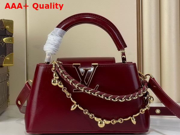 Louis Vuitton Capucines East West Mini Grenat Red Cowhide Leather Elevated with Gold Toned LV Initials M25473 Replica