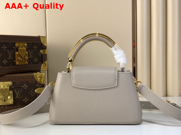 Louis Vuitton Capucines East West Mini Handbag in Galet Gray Taurillon Leather with Metallic Handle Replica