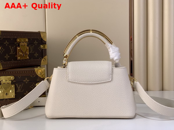 Louis Vuitton Capucines East West Mini Handbag in Vanilla Taurillon Leather with Metallic Handle M26345 Replica