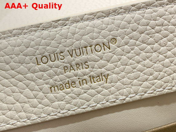 Louis Vuitton Capucines East West Mini Handbag in Vanilla Taurillon Leather with Metallic Handle M26345 Replica