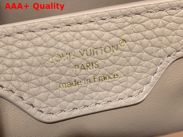 Louis Vuitton Capucines Mini Hanbag in Galet Grey Taurillon Leather Adorned with a Crown of Mother of Pearl Effect Monogram Flowers M11341 Replica
