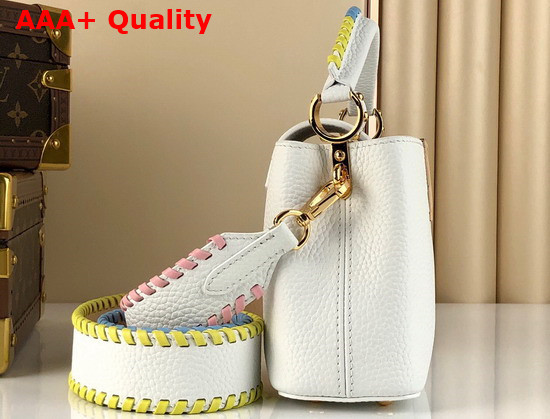 Louis Vuitton Capucines Mini Handbag Snow Taurillon Leather and Features Rich Braided Details Replica