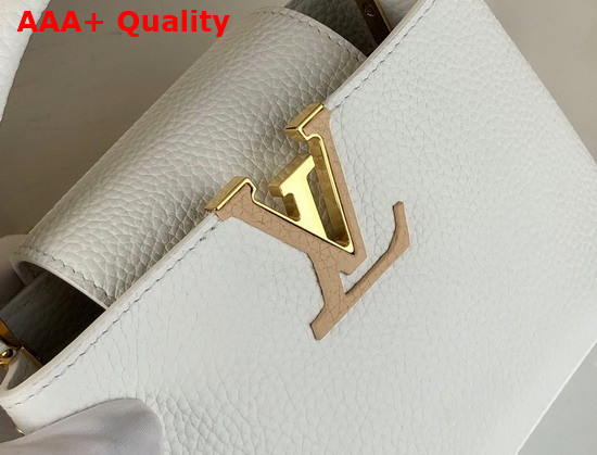 Louis Vuitton Capucines Mini Handbag Snow Taurillon Leather and Features Rich Braided Details Replica