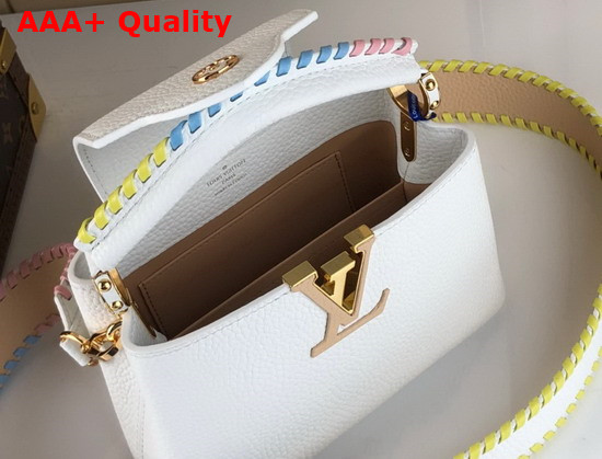 Louis Vuitton Capucines Mini Handbag Snow Taurillon Leather and Features Rich Braided Details Replica