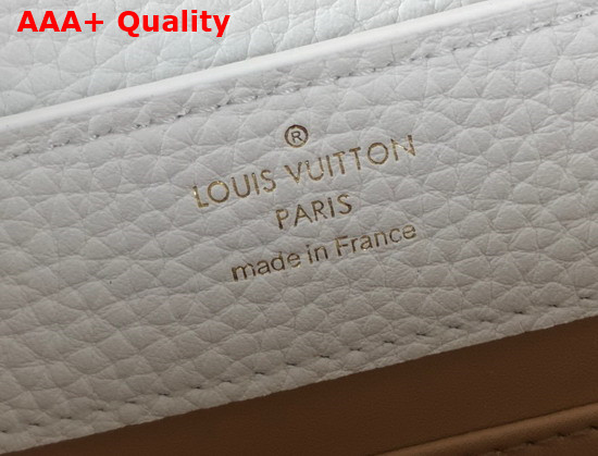 Louis Vuitton Capucines Mini Handbag Snow Taurillon Leather and Features Rich Braided Details Replica