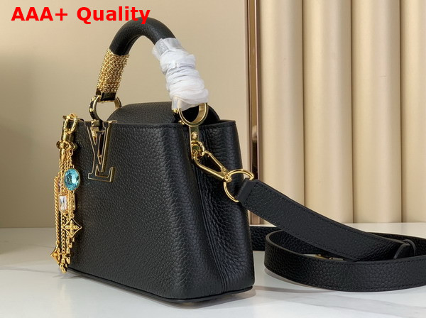 Louis Vuitton Capucines Mini Handbag in Black Taurillon Leather Embellished with Tonal LV Initials and a Decorative Stone Embellished Charm Replica