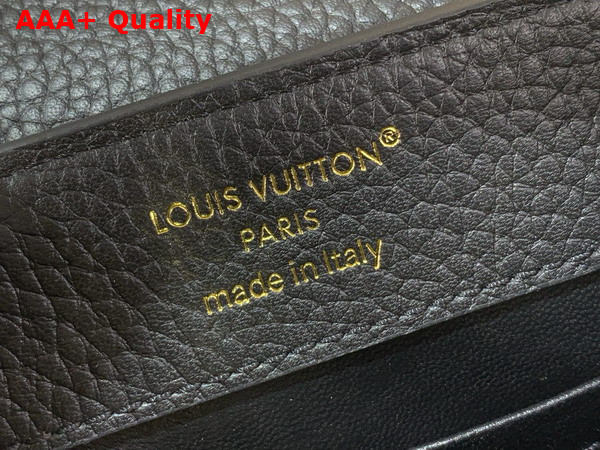 Louis Vuitton Capucines Mini Handbag in Black Taurillon Leather Embellished with Tonal LV Initials and a Decorative Stone Embellished Charm Replica