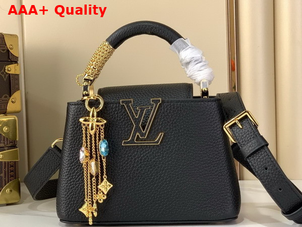 Louis Vuitton Capucines Mini Handbag in Black Taurillon Leather Embellished with Tonal LV Initials and a Decorative Stone Embellished Charm Replica