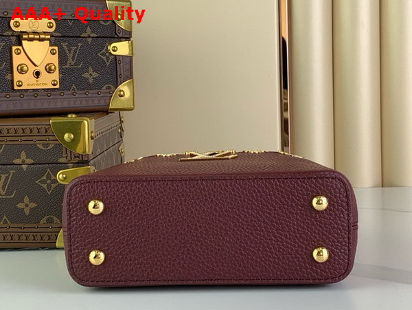 Louis Vuitton Capucines Mini Handbag in Burgundy Taurillon Leather with Gold Color Monogram Flowers Replica