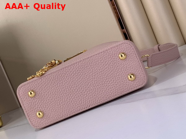 Louis Vuitton Capucines Mini Handbag in Jasmine Pink Taurillon Leather Embellished with Tonal LV Initials and a Decorative Stone Embellished Charm Replica