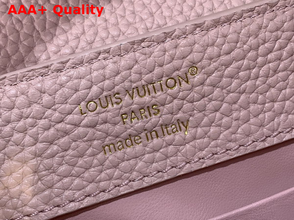 Louis Vuitton Capucines Mini Handbag in Jasmine Pink Taurillon Leather Embellished with Tonal LV Initials and a Decorative Stone Embellished Charm Replica
